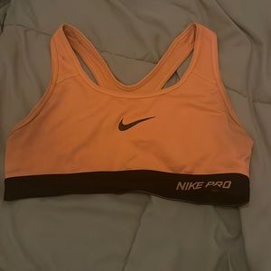 Orange and black Nike sprite bra